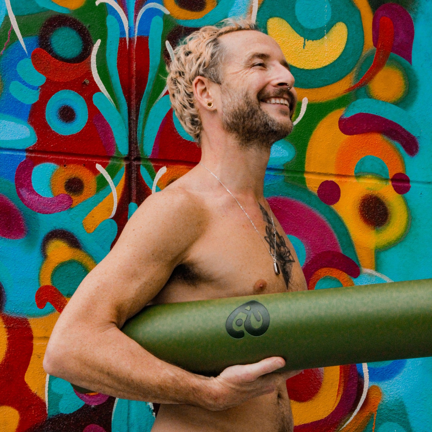 Joseph Armstrong with Eco-conscious natural rubber yoga mat